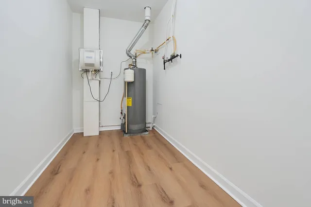 a view of empty room with a door