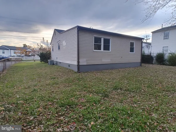 a view of a backyard of the house