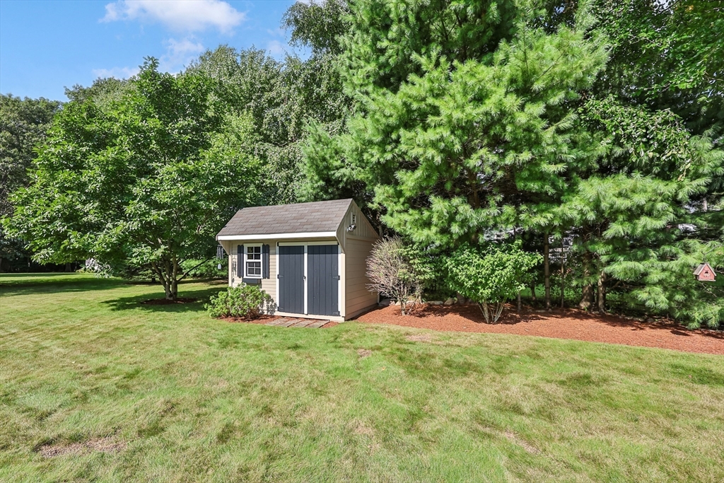 30 Bernardo Drive Attleboro, MA 02703 - Photo 12 of 37 a view of a house with a yard