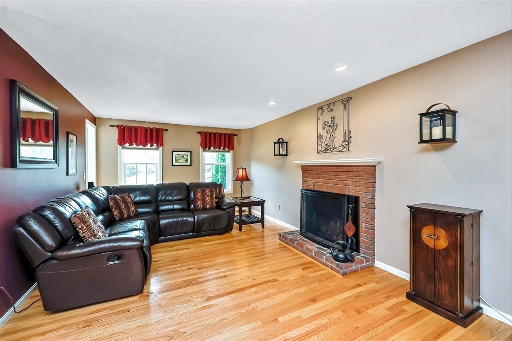 30 Bernardo Drive Attleboro, MA 02703 - Photo 21 of 37 a living room with furniture window and a fireplace