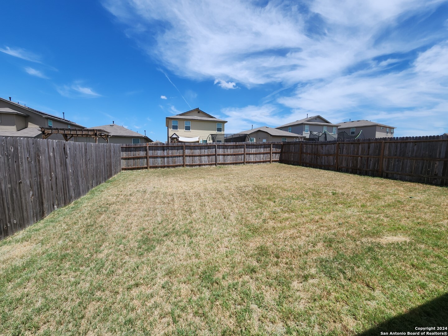 6619 Dynamic Sound San Antonio, TX 78252 - Photo 19 of 20 a view of a terrace with a yard