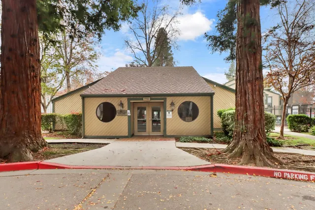 a house view with a backyard space