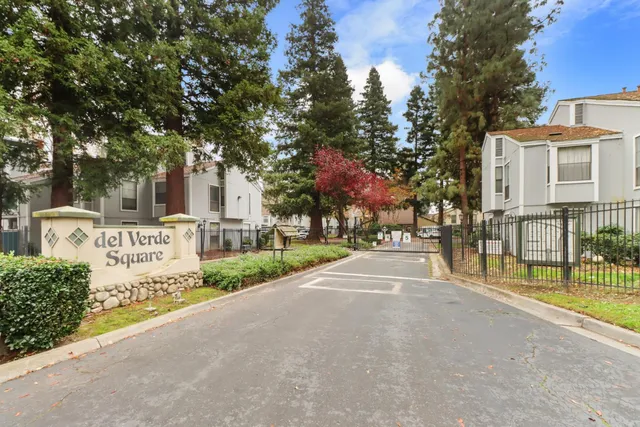 a sign board with parking space
