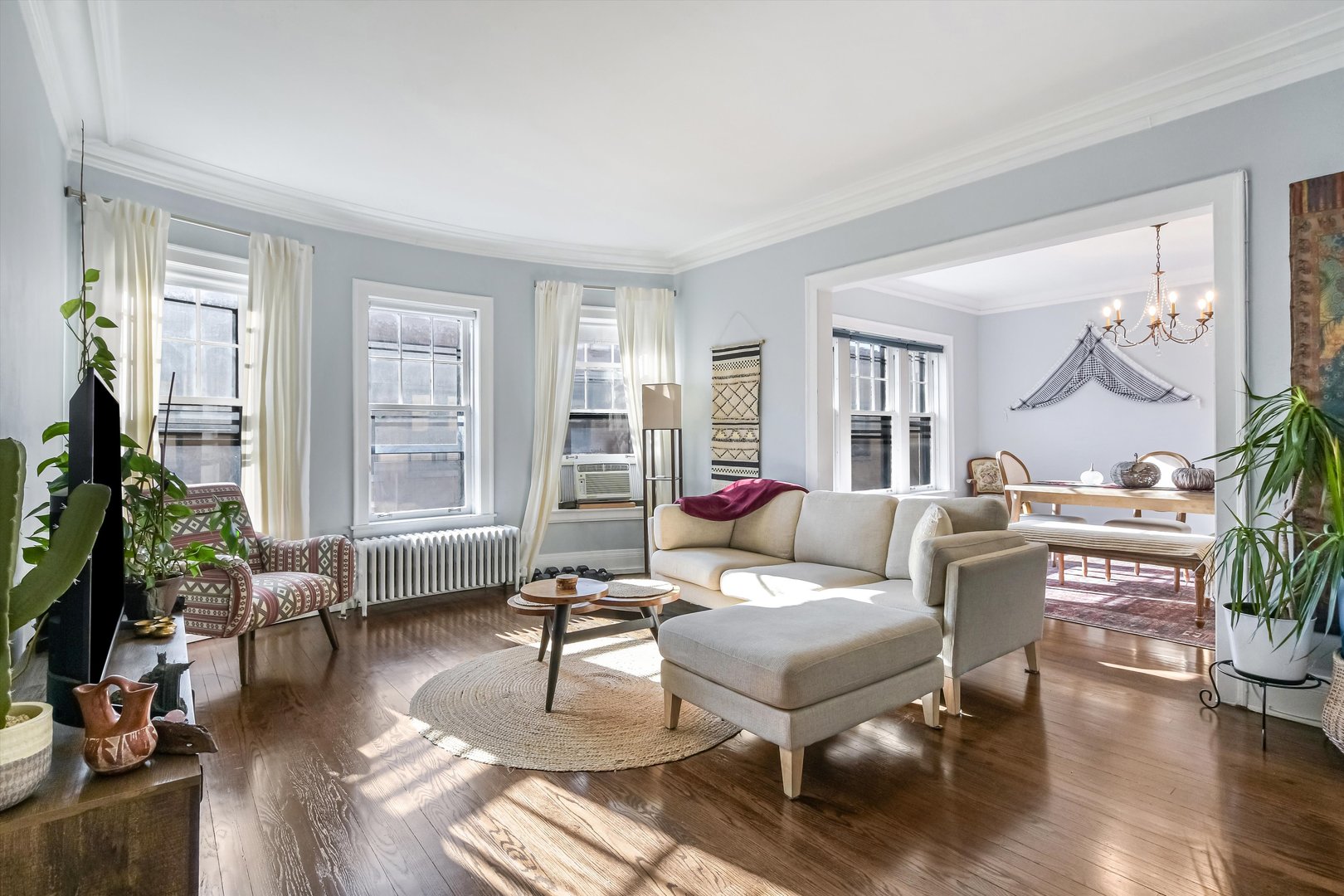 832 Michigan Avenue, Unit 3G Evanston, IL 60202 - Photo 2 of 24 a living room with furniture and wooden floor