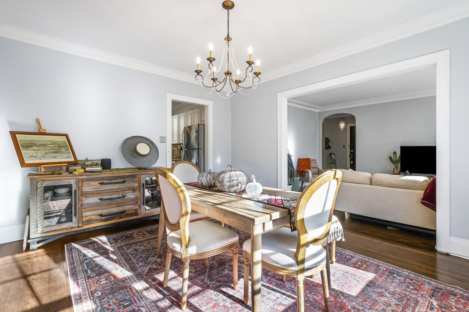 832 Michigan Avenue, Unit 3G Evanston, IL 60202 - Photo 6 of 24 a view of a dining room with furniture and a chandelier