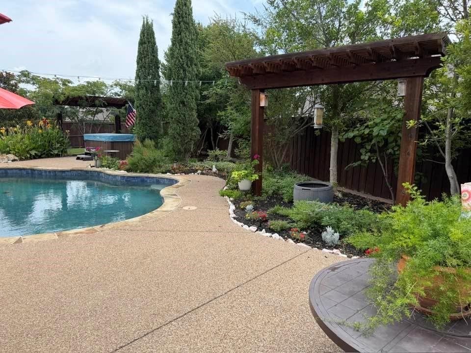2414 Strathfield Lane Trophy Club, TX 76262 - Photo 1 of 1 Rare Half-Acre Estate in The Highlands at Trophy Club! Botanical-inspired gardens, salt-water pool, hot tub, four pergolas, multiple spaces for entertaining, and large play area for endless possibilities!