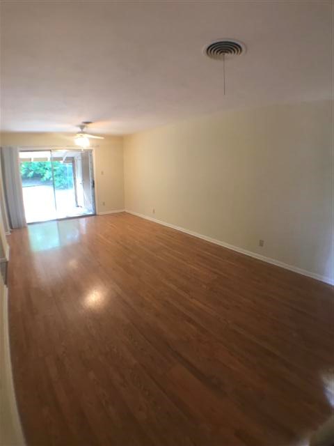 2310 Rebel Road, Unit B Austin, TX 78704 - Photo 3 of 13 en empty room with windows and closet
