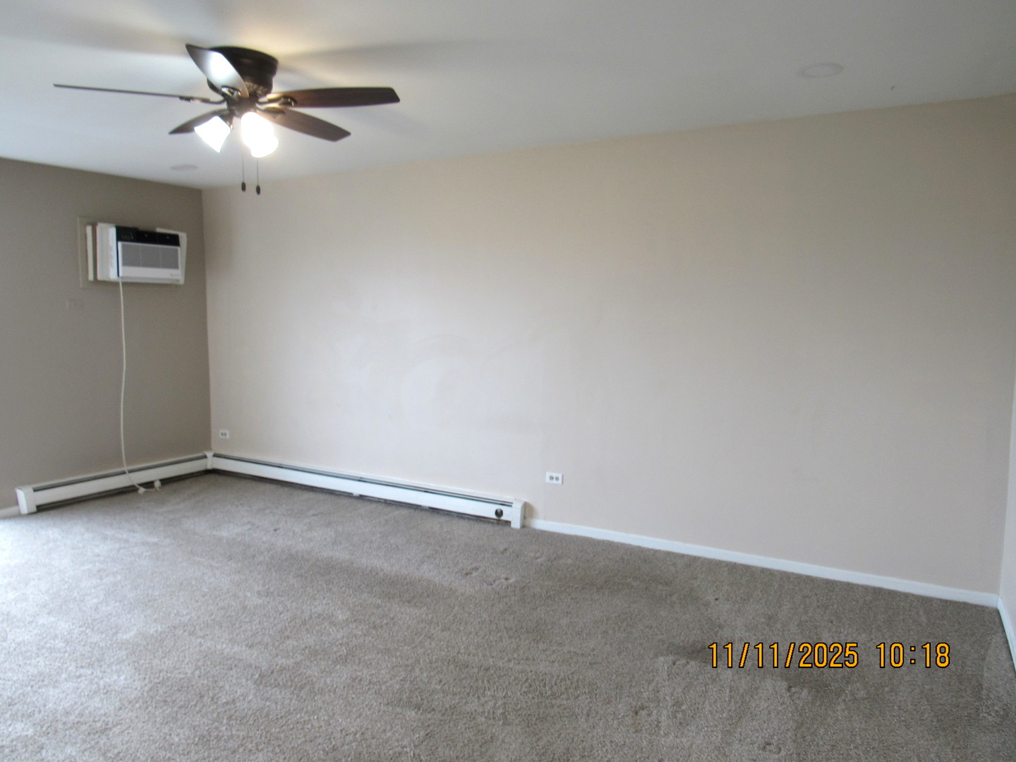1156 Copperfield Lane, Unit E Schaumburg, IL 60193 - Photo 5 of 13 a view of an empty room