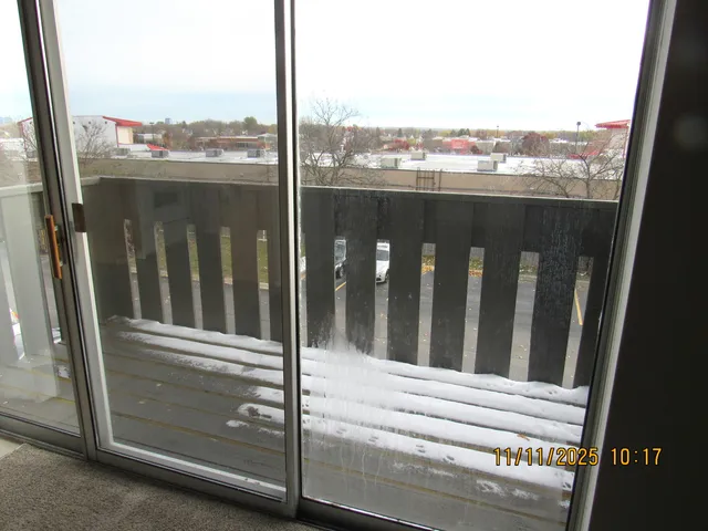 a view of a bathroom from a hallway