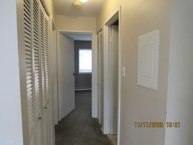 a bathroom with a tub and a shower