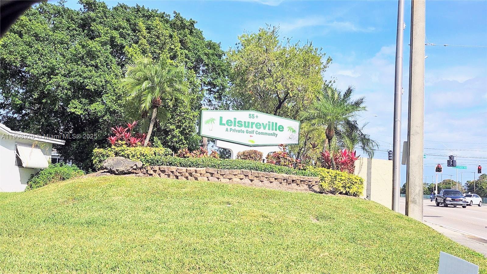 300 Northwest 28th Court Pompano Beach, FL 33064 - Photo 30 of 30 a view of a house with a yard and potted plants