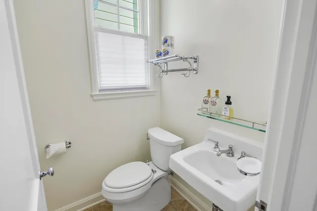 a living room with furniture fireplace and flat screen tv