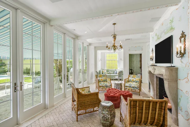 a view of a dining room with furniture and a window