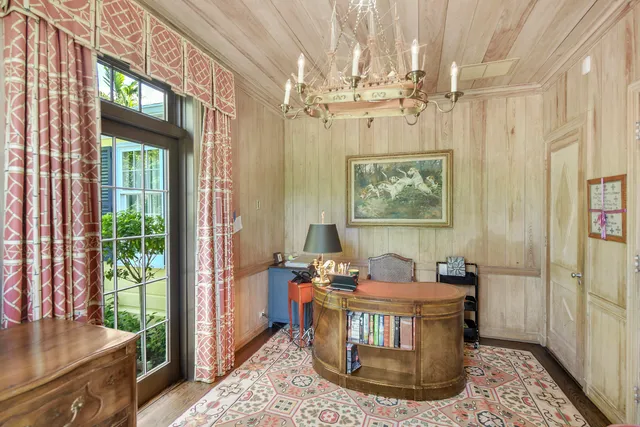 a bedroom with furniture and a window