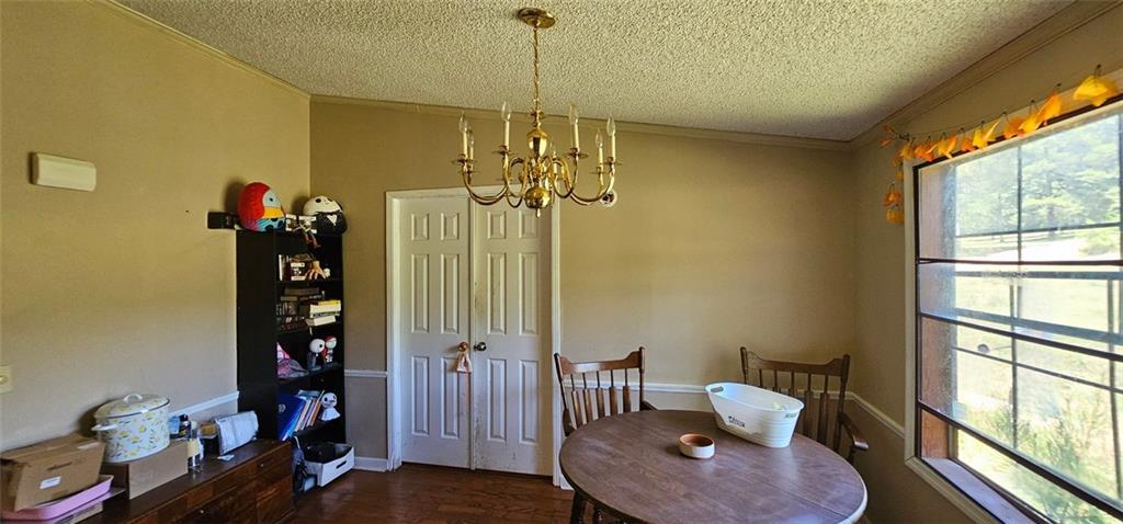 944 Lite-N-Tie Road Macon, GA 31211 - Photo 15 of 36 a living room with furniture stairs and a window