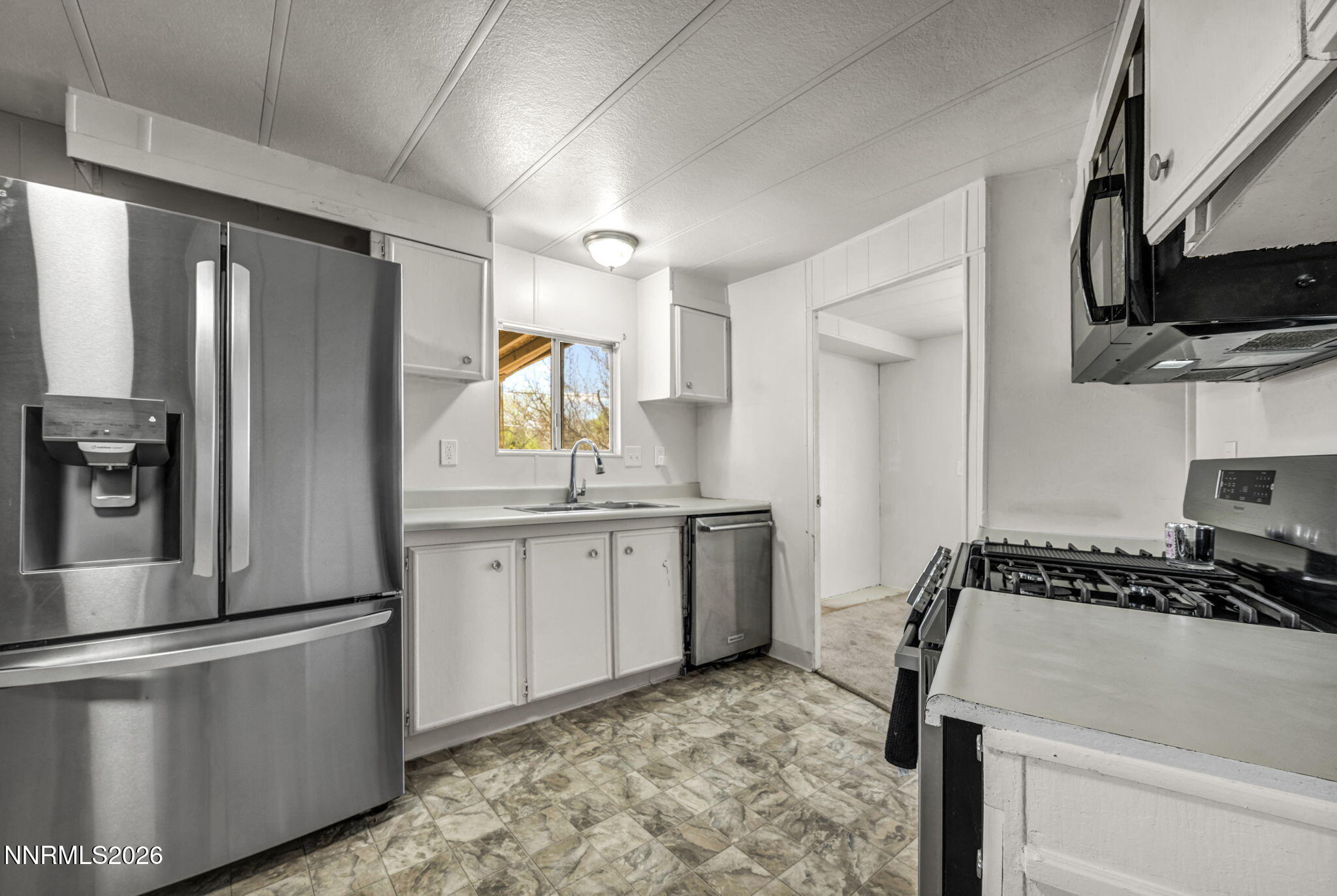 150 West 4th Avenue Sun Valley, NV 89433 - Photo 3 of 15 27-web-or-mls-150-w-4th-ave