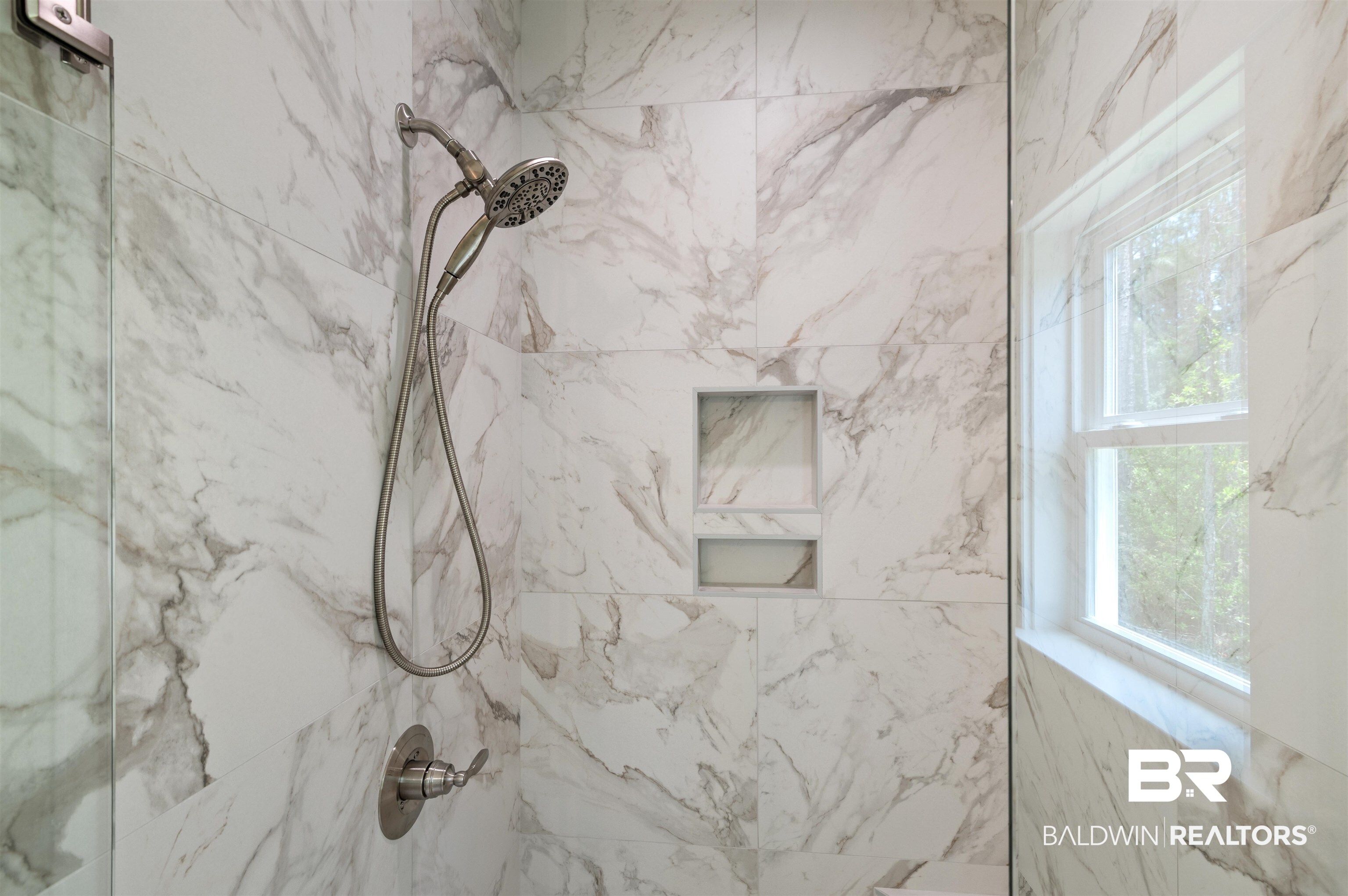 657 Island Way Gulf Shores, AL 36542 - Photo 18 of 59 Full bath with a marble finish shower