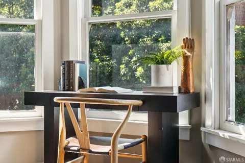 a dining room with a window