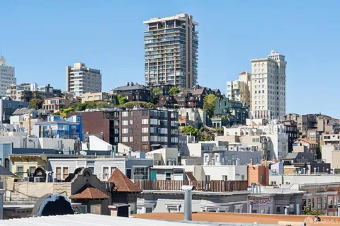 a city view with tall buildings
