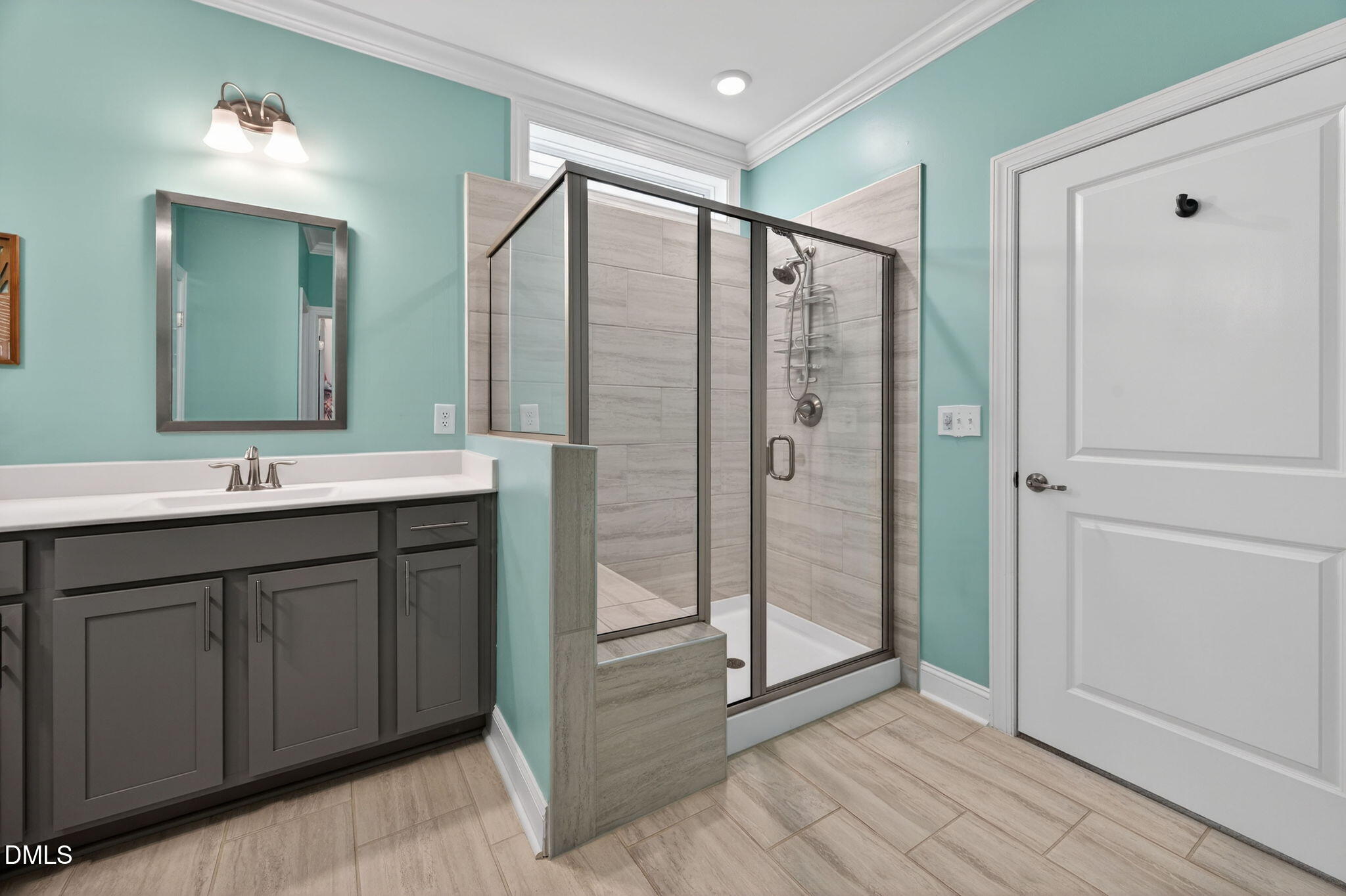 118 Mahogany Raleigh, NC 27610 - Photo 27 of 74 a bathroom with a double vanity sink mirror and shower