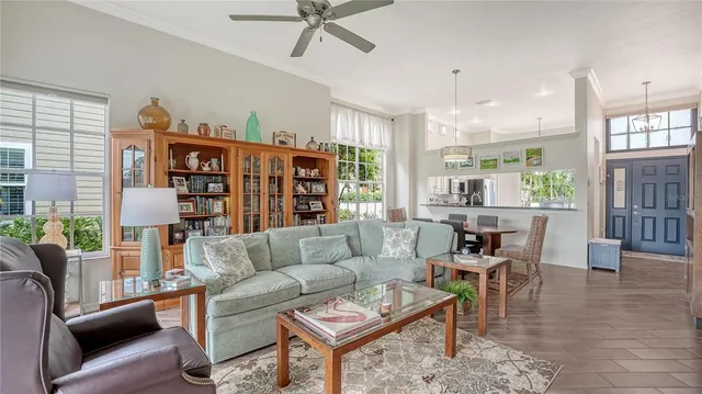 a living room with furniture and a garden