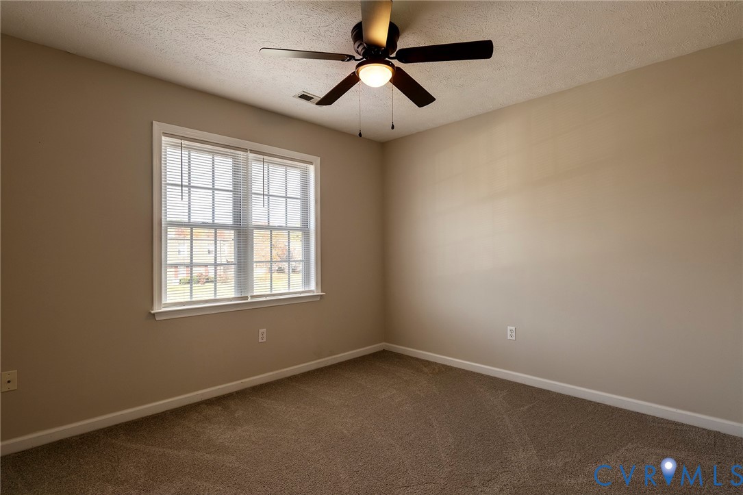 1525 Clarkson Road Richmond, VA 23224 - Photo 13 of 19 an empty room with a window
