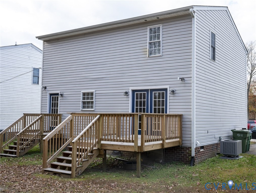 1525 Clarkson Road Richmond, VA 23224 - Photo 18 of 19 a view of a house with backyard and deck