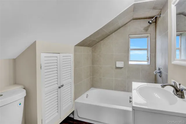 a bathroom with a sink and a bathtub