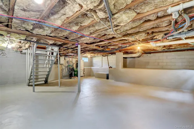 a view of a room with wooden walls