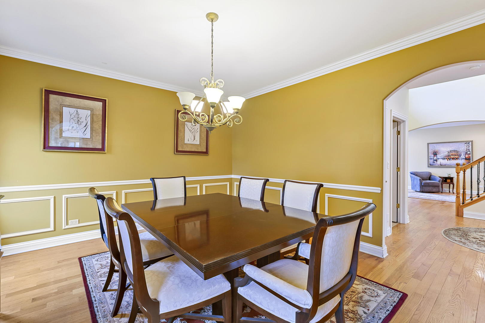 3206 Springdale Avenue Glenview, IL 60025 - Photo 7 of 20 a view of a dining room with furniture and wooden floor