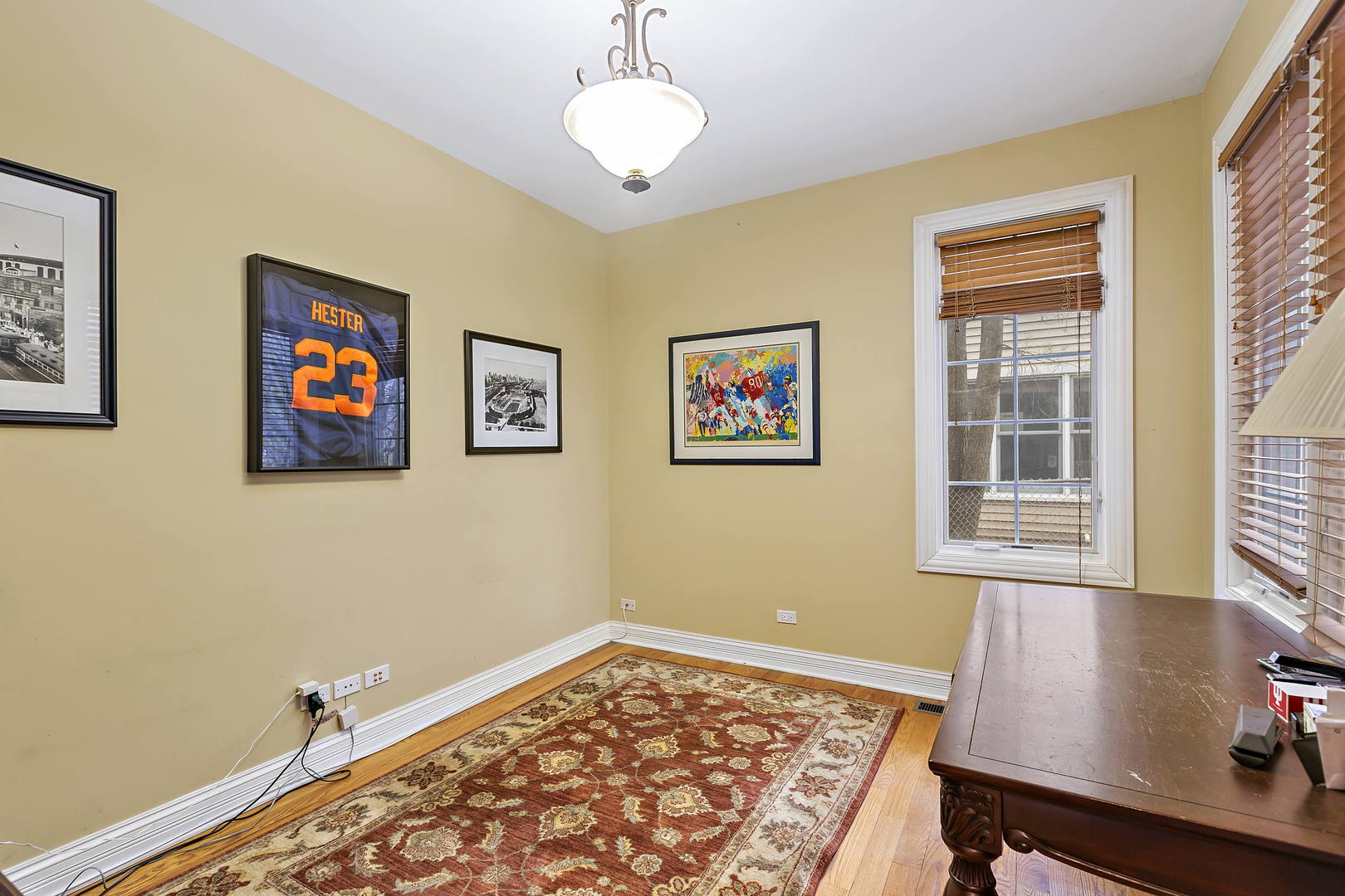 3206 Springdale Avenue Glenview, IL 60025 - Photo 10 of 20 a view of a bedroom with wooden floor and windows