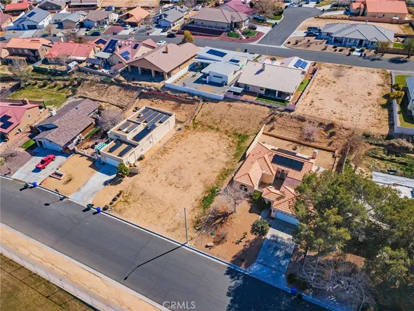 an aerial view of a building with outdoor space