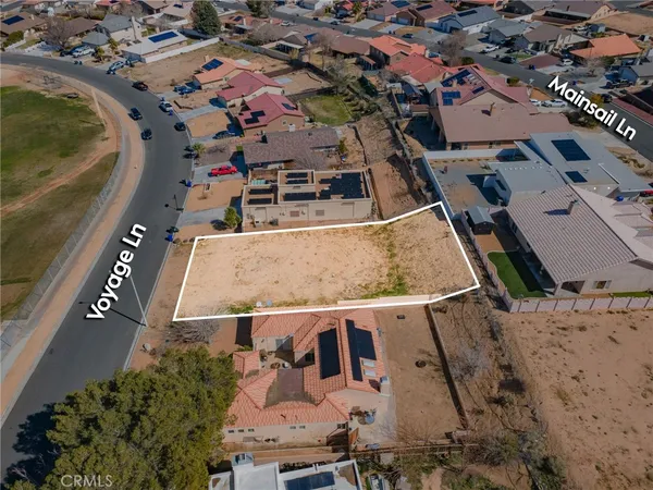 an aerial view of a house with a outdoor space