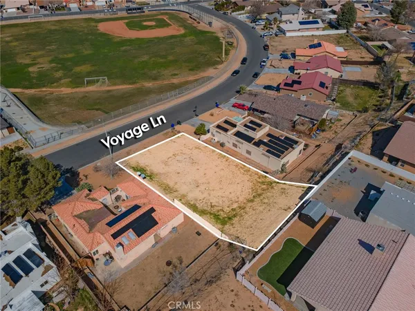 an aerial view of a pool table and chairs