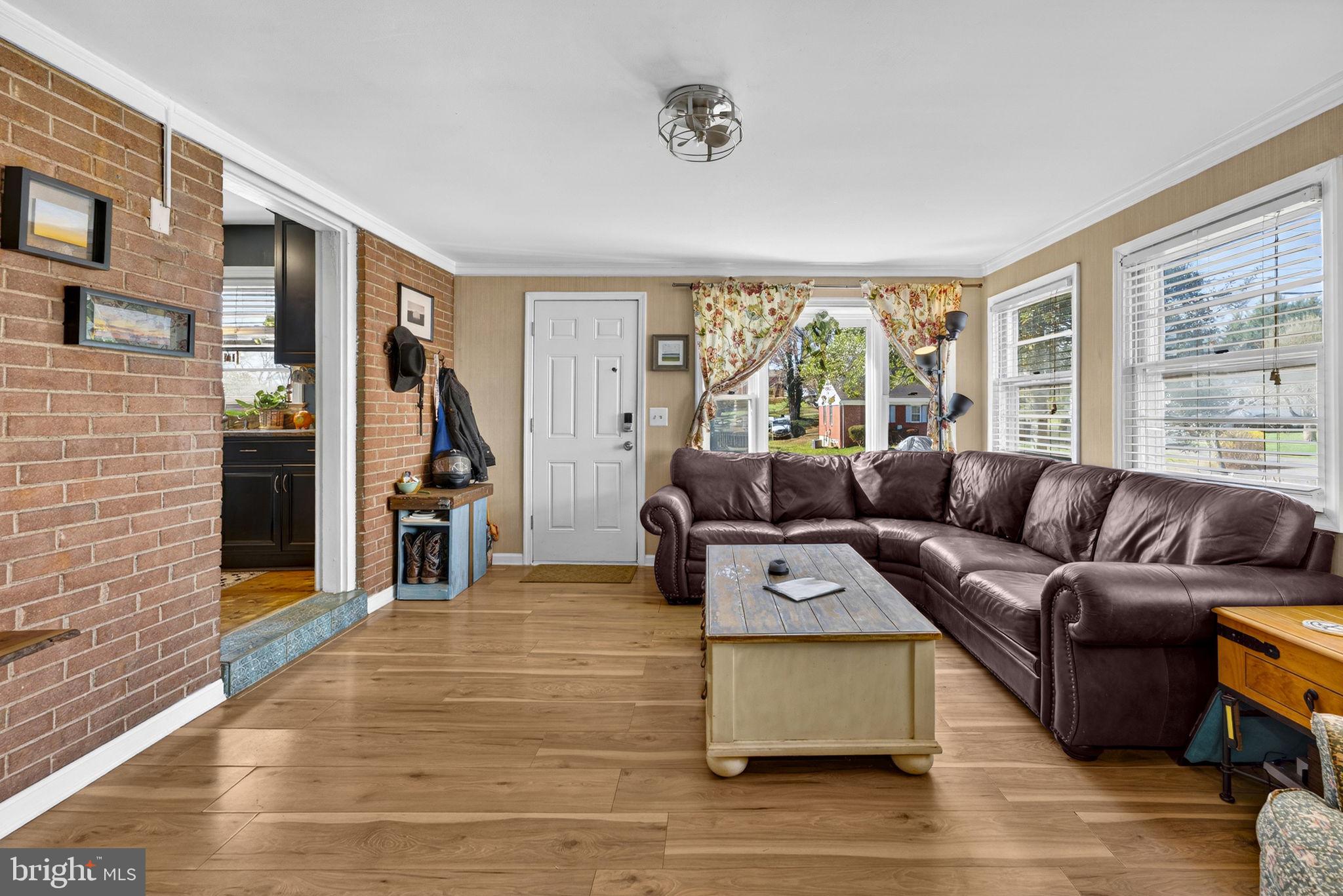 134 Garr Avenue Culpeper, VA 22701 - Photo 17 of 43 a living room with furniture and a large window