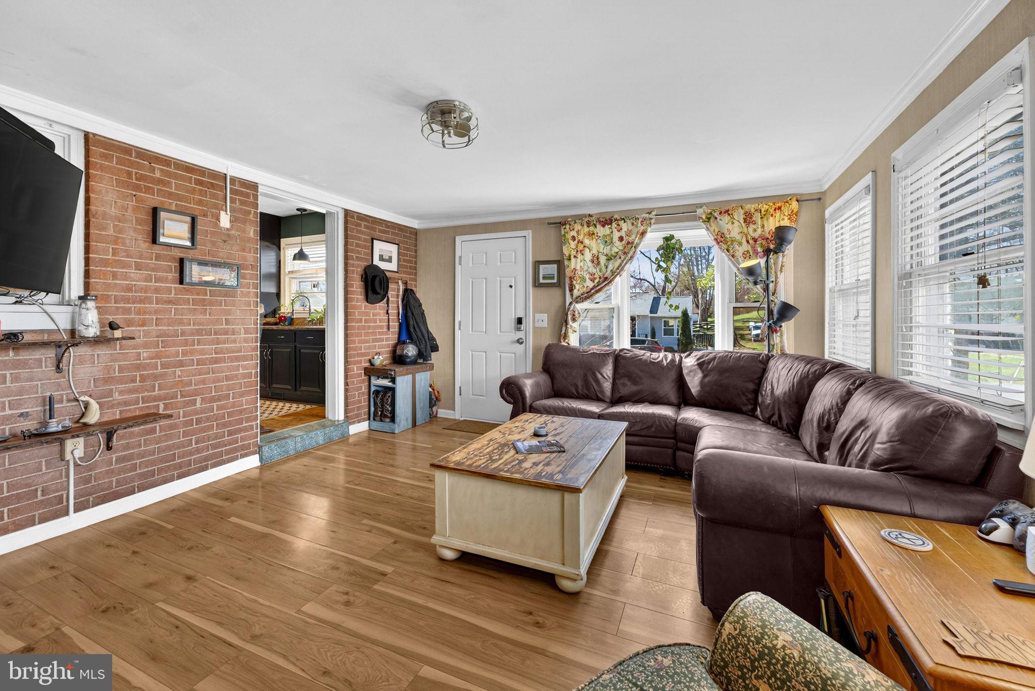 134 Garr Avenue Culpeper, VA 22701 - Photo 18 of 43 a living room with furniture and a flat screen tv