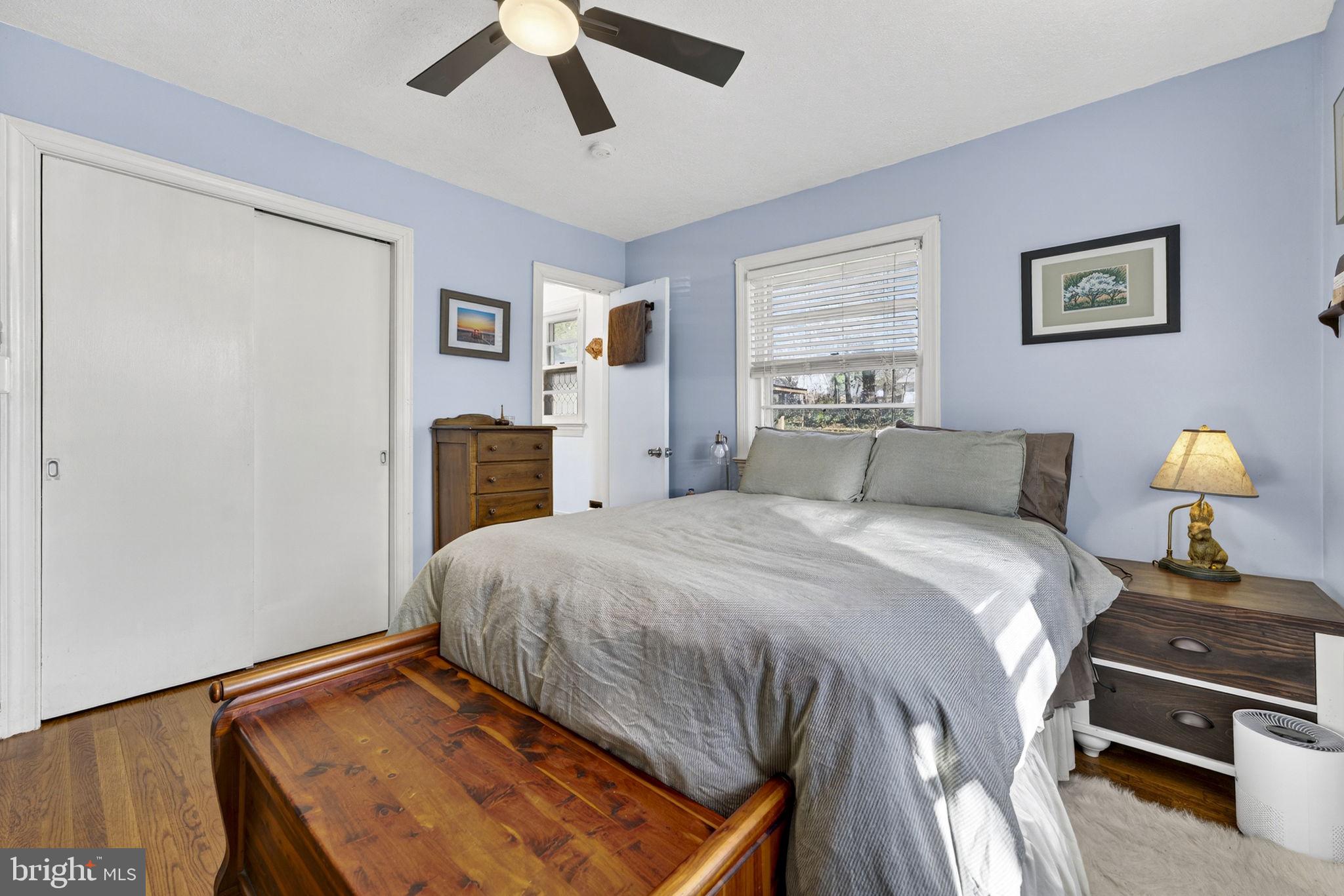 134 Garr Avenue Culpeper, VA 22701 - Photo 23 of 43 a bedroom with a bed and wooden floor