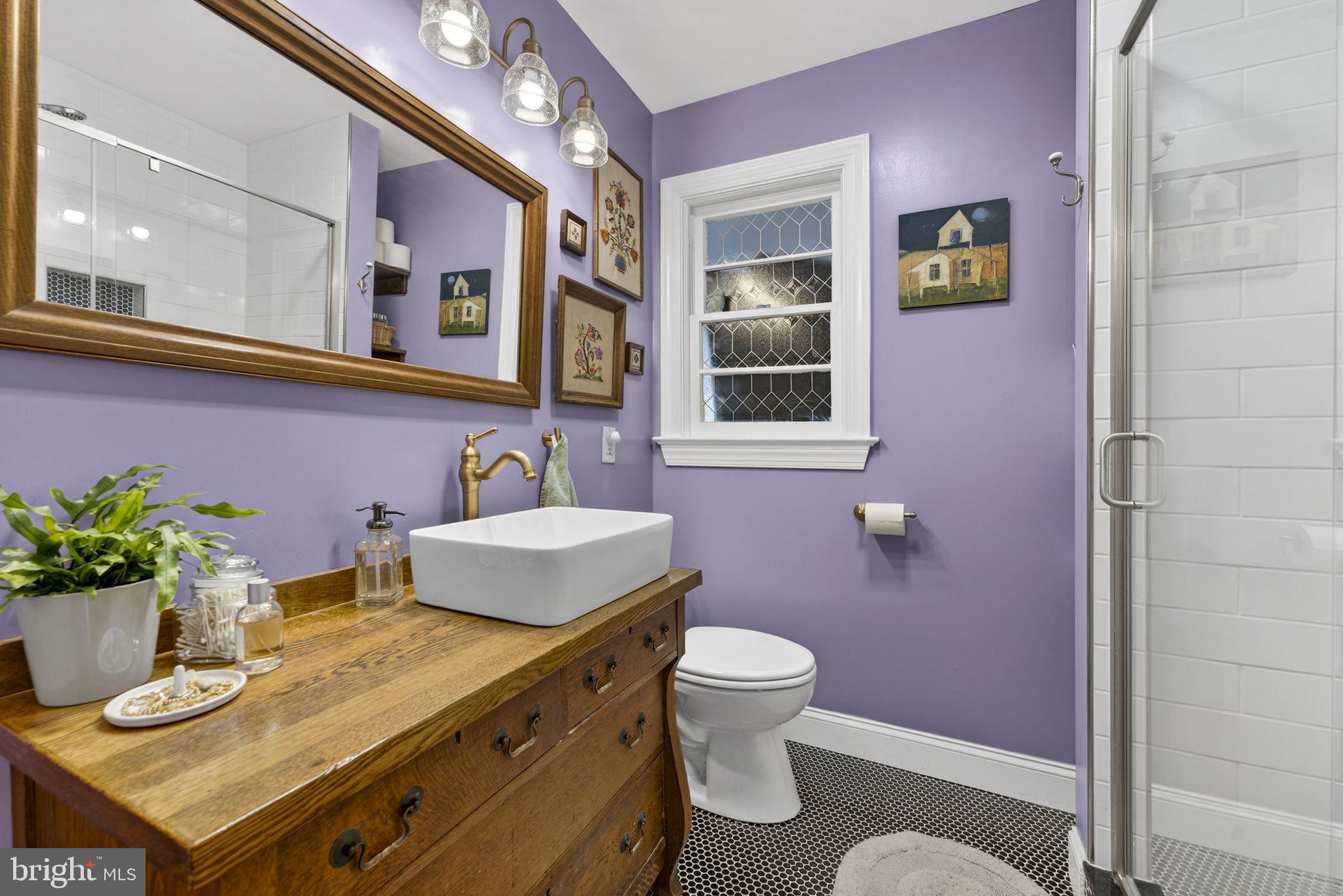 134 Garr Avenue Culpeper, VA 22701 - Photo 30 of 43 a bathroom with a granite countertop sink and a mirror
