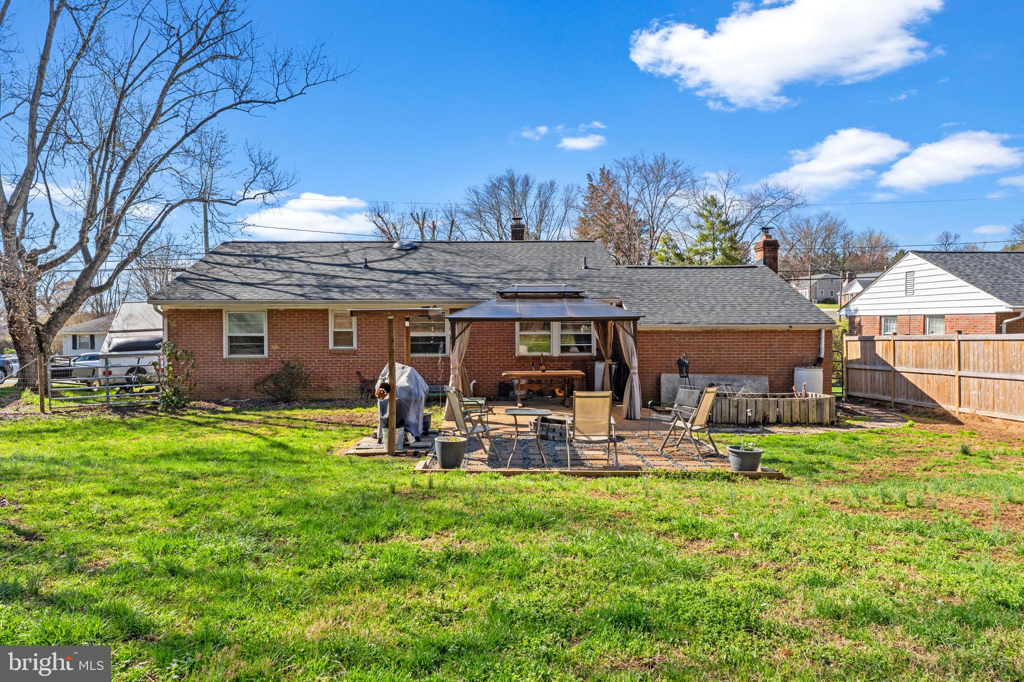 134 Garr Avenue Culpeper, VA 22701 - Photo 39 of 43 a view of a house with backyard and sitting area