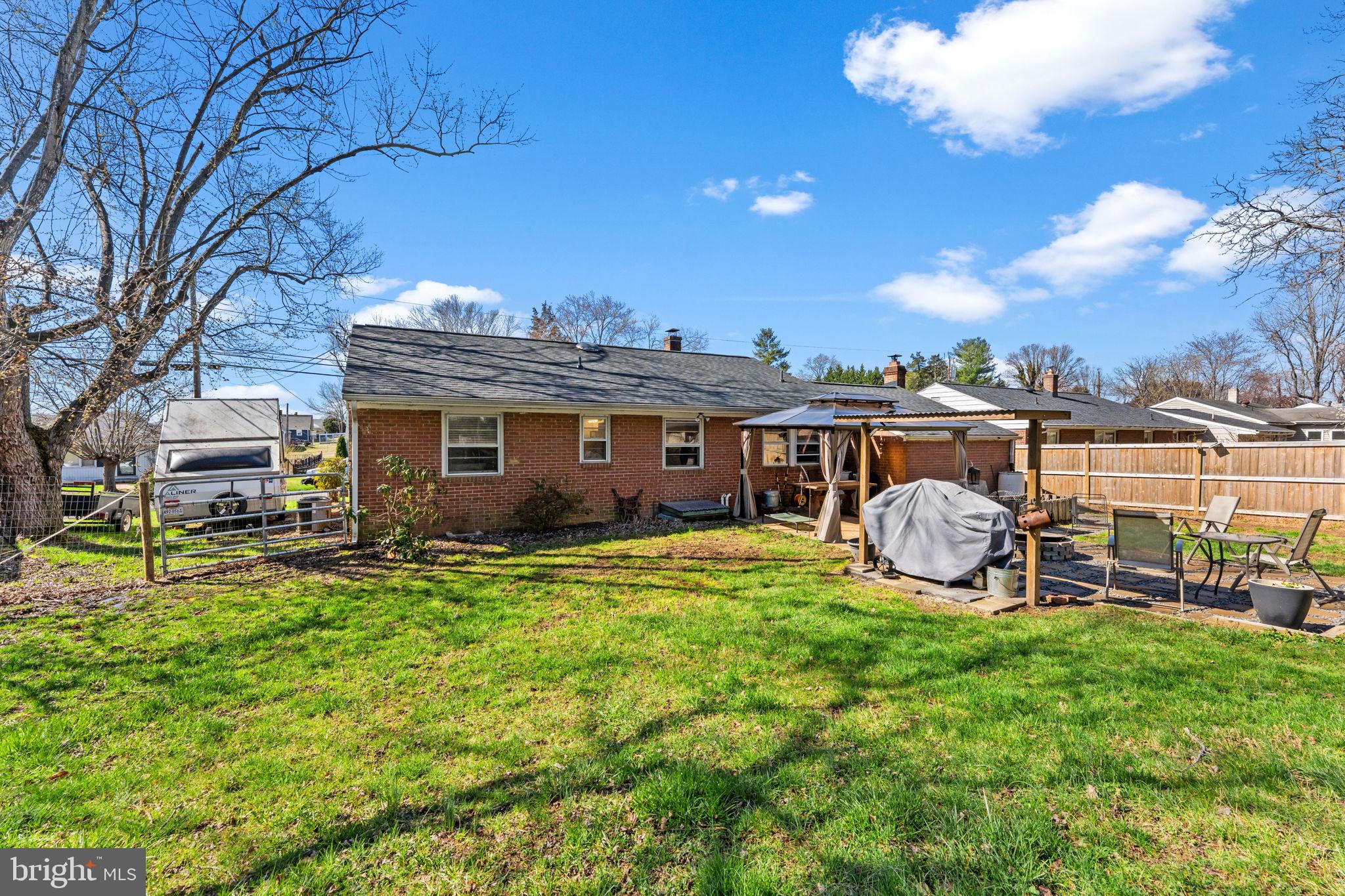134 Garr Avenue Culpeper, VA 22701 - Photo 40 of 43 a view of a house with backyard and sitting area