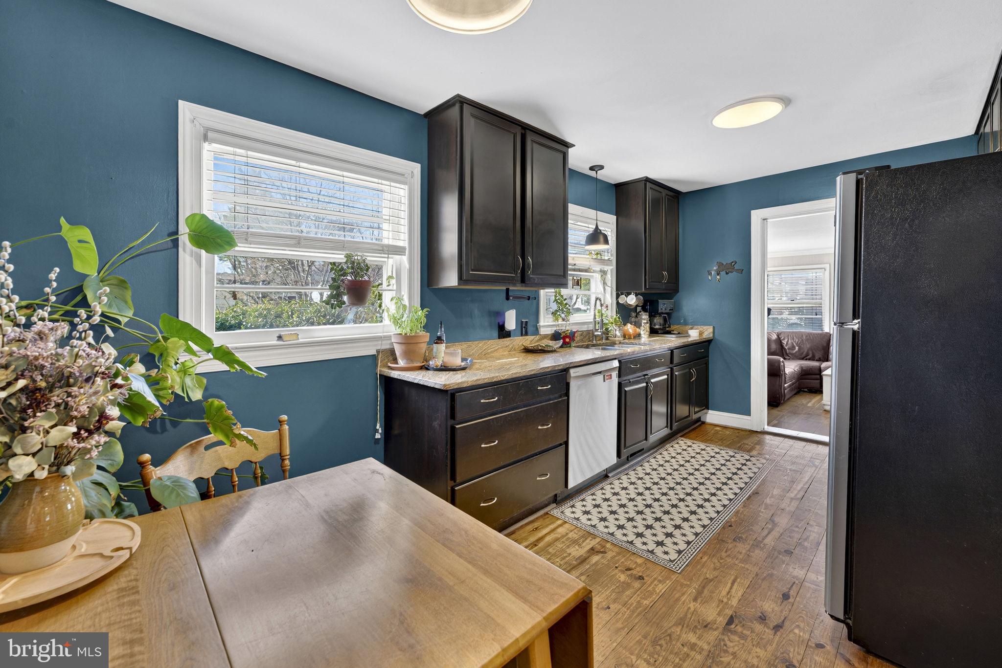 134 Garr Avenue Culpeper, VA 22701 - Photo 10 of 43 a kitchen with a sink stove and cabinets