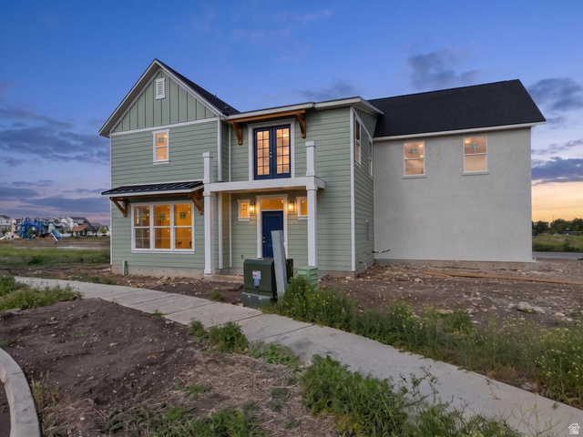 720 South Harrison Drive Springville, UT 84663 - Photo 12 of 14 Two-story residence featuring light green siding and a dark shingle roof