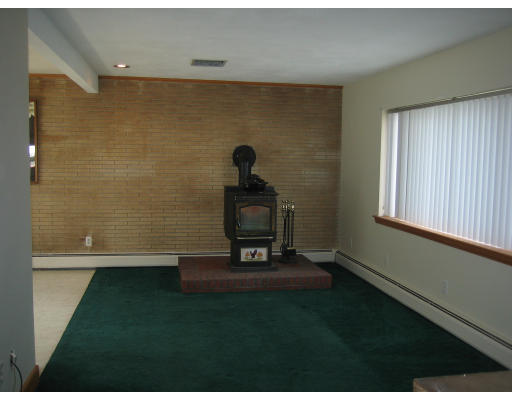 28 Eustis Street Saugus, MA 01906 - Photo 2 of 9 a bathroom with a sink and a window