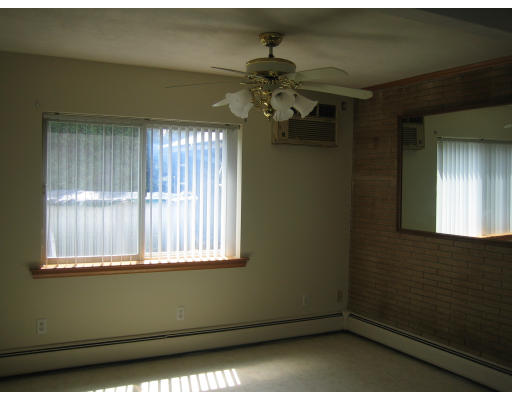 28 Eustis Street Saugus, MA 01906 - Photo 3 of 9 a view of a room that has a window in it