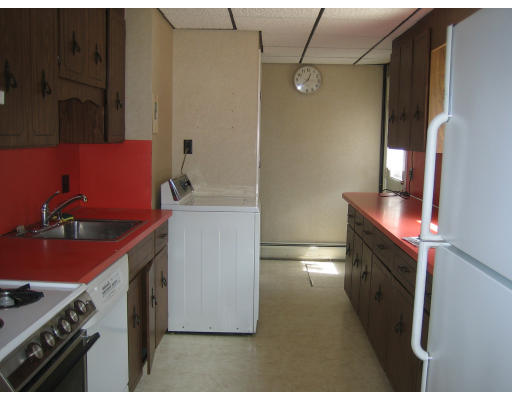 28 Eustis Street Saugus, MA 01906 - Photo 4 of 9 a bathroom with a sink and a washing machine