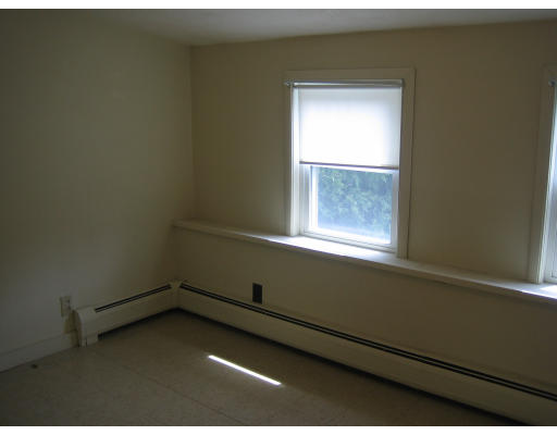 28 Eustis Street Saugus, MA 01906 - Photo 8 of 9 an empty room with a window