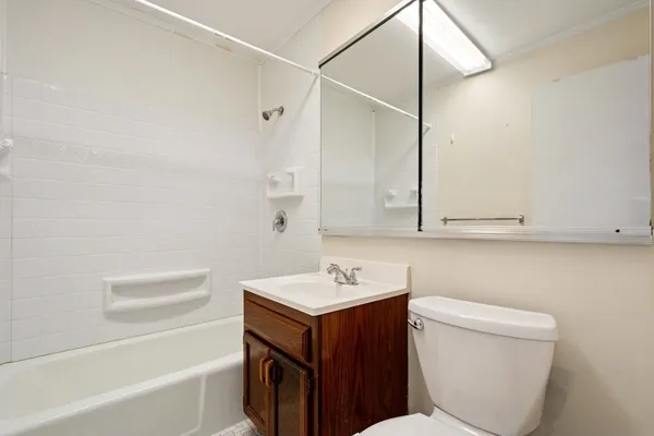 a room that has a bed and a window