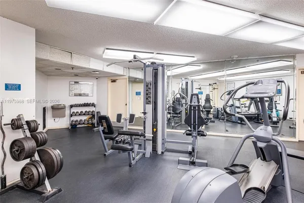 a view of a swimming pool with a lounge chair