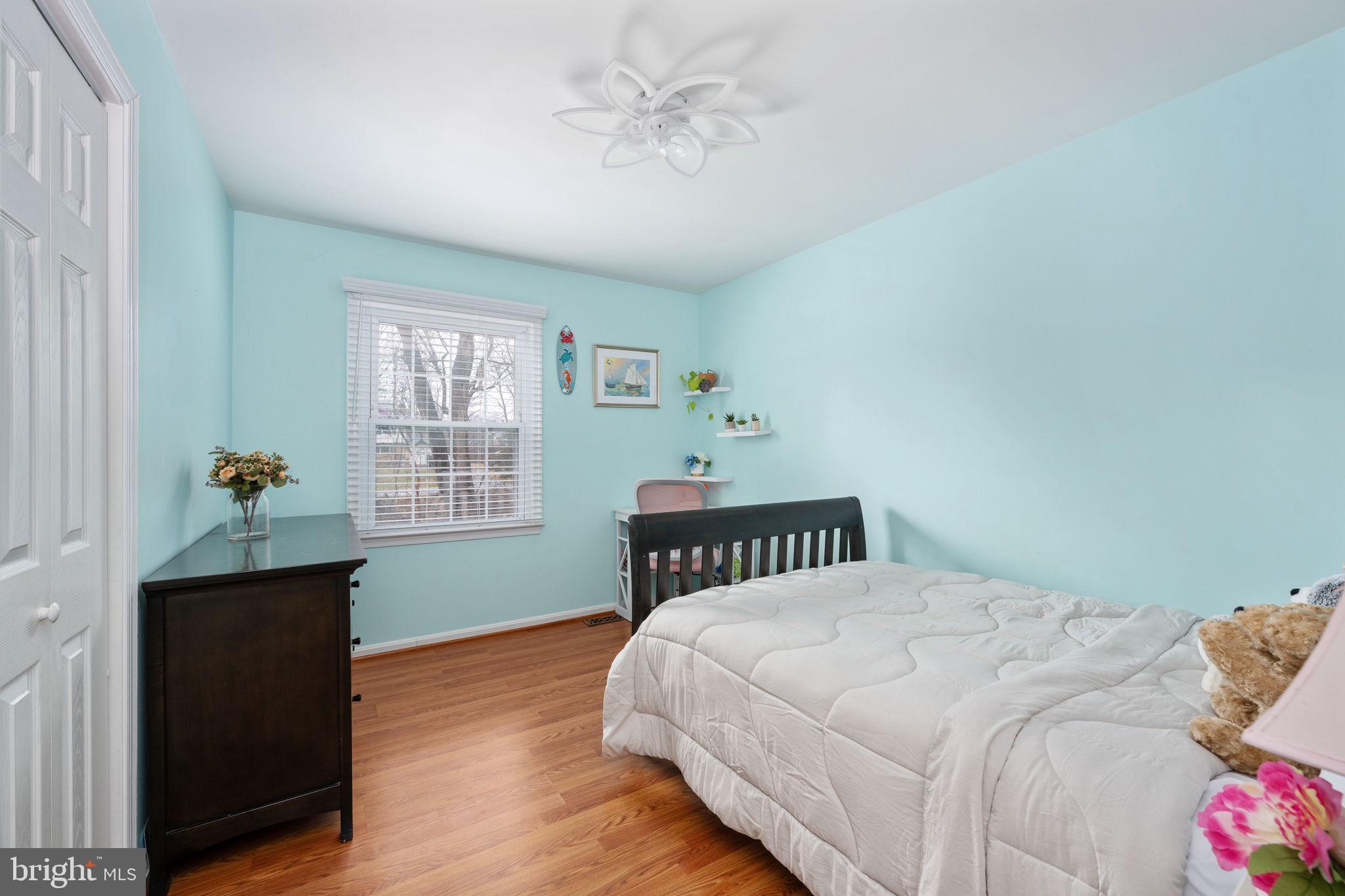 6765 Settlers Ridge Road Warrenton, VA 20187 - Photo 24 of 66 a bedroom with a bed and a window