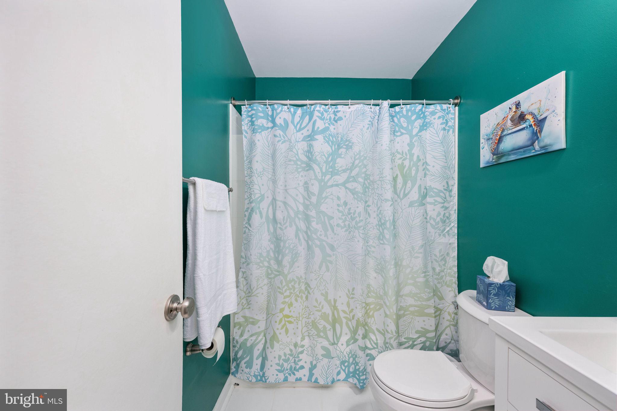 6765 Settlers Ridge Road Warrenton, VA 20187 - Photo 34 of 66 a bathroom with a toilet and shower